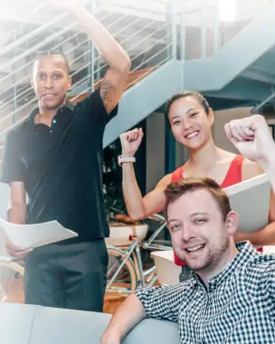 Team members celebrating together in the office